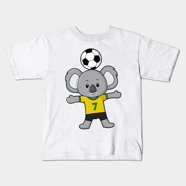 Koala as Soccer player with Soccer ball Kids T-Shirt by Markus Schnabel